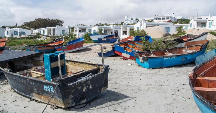 Colourful fishing boats against a charming backdrop, Paternoster